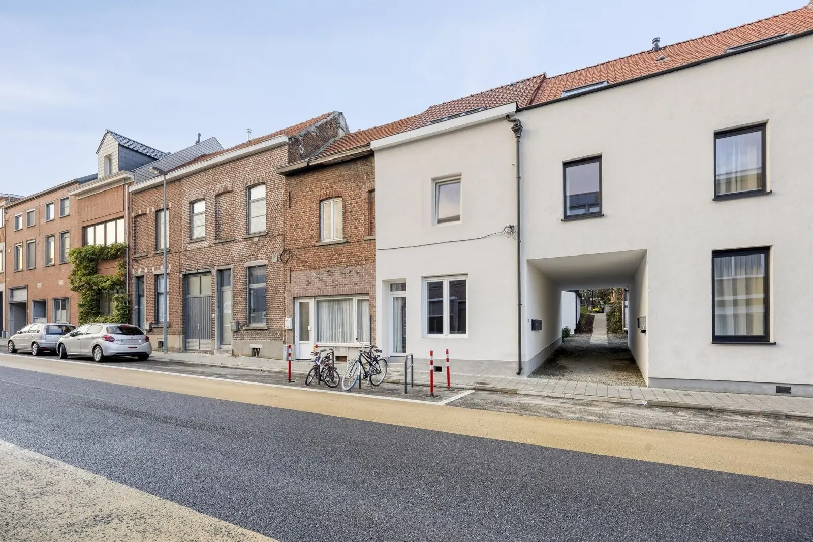 Tervuursesteenweg 122 in Heverlee — voorgevel met doorgang naar de binnenkoer